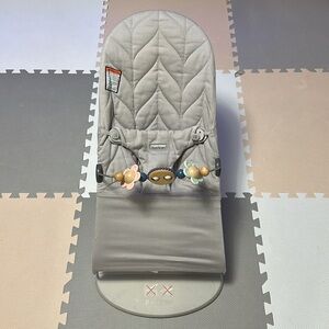 BabyBjorn Light Gray Quilted Baby Bouncer with Flower Toy Bar